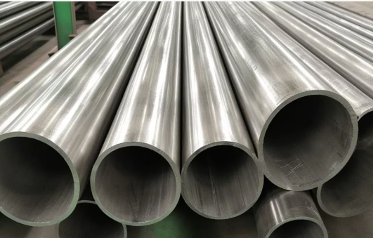  A close-up view of a welded steel pipe, showcasing its smooth surface and welded seam, commonly used in construction and industrial applications.