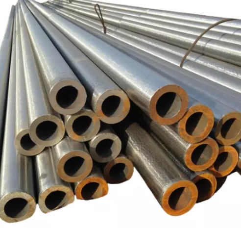 A close-up view of a welded steel pipe, showcasing its smooth surface and welded seam, commonly used in construction and industrial applications.
